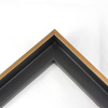 This small, L-shaped floating canvas frame in matte black features a brushed gold face.

1.5 " depth from wall, and .5 " width: ideal for medium and large canvases on thin (3/4 " deep) stretcher bars.  Pair this frame with a painting or Giclée print for an authentic fine art display. 

*Note: These solid wood, custom canvas floaters are for stretched canvas prints and paintings, and raised wood panels.