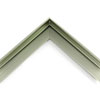 1" " stepped metal floater frame. This frame has a slim face and medium profile. It comes in sage green and features a horizontal brushed texture. Dispersed light is reflected.