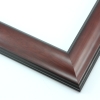 This simple, reverse curve frame features a mahogany wash with that highlights the natural wood grain.  The subtly bevelled inner and outer edges are matte black.

1.75 " width: ideal for small or medium size images.  The plain, natural appearance of this frame makes it a great border for almost any artwork: photograph, painting or giclee print.