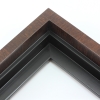 This solid wood canvas floater frame features a glossy deep walnut finish with wood grain detailing on the outside edge and topmost face.  The inside step and base are a matte black. 

Display your favourite gallery wrapped Giclée print or painting with authentic, fine art style. This floater frame is ideal for small to extra large canvases mounted on thick (1.5 " deep) stretcher bars.

*Note: These solid wood, custom canvas floaters are for stretched canvas prints and paintings, and raised wood panels.