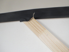 An example of a crossbreak tearing from heavy weight being placed on the edge of the box during shipping